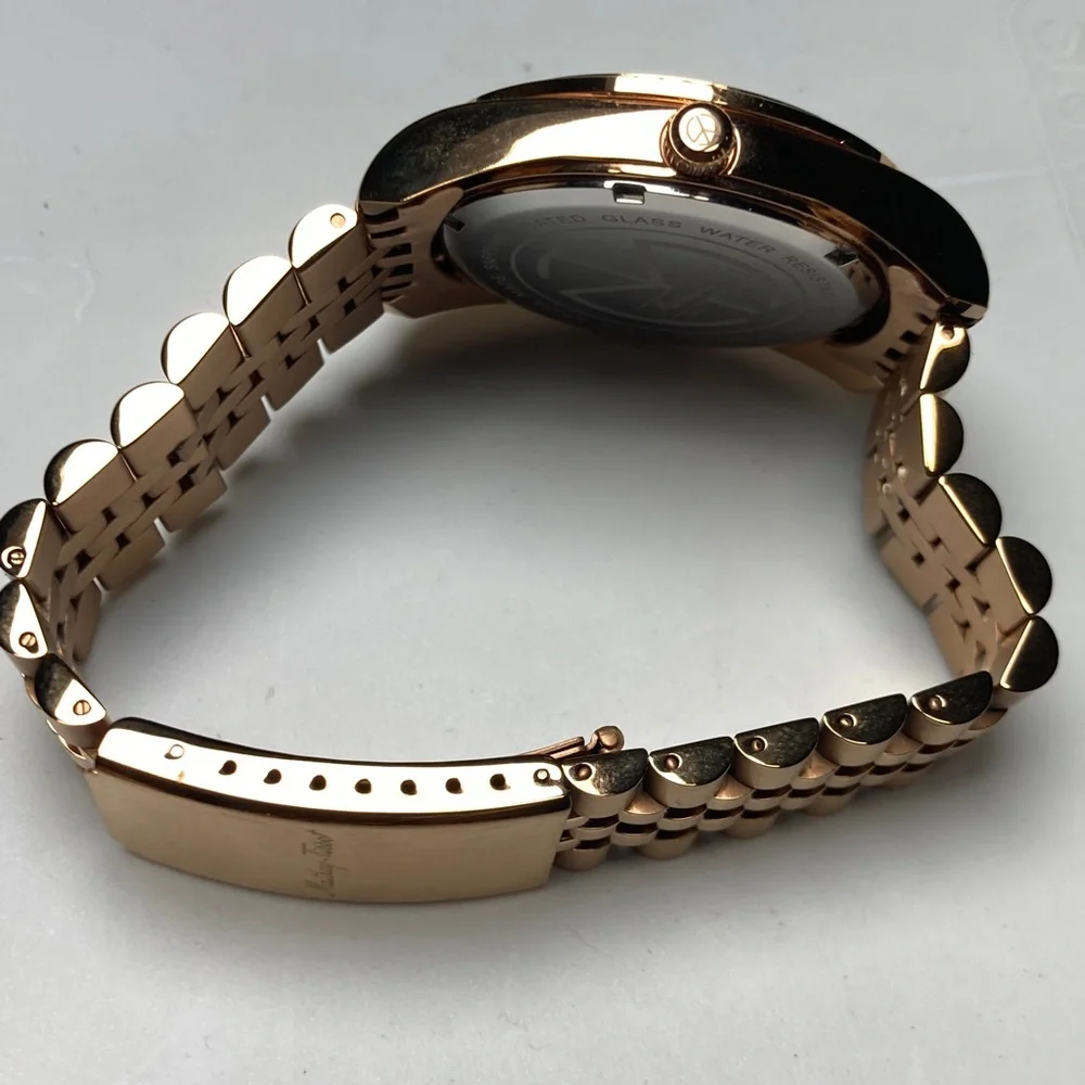 Mathey Tissot H709 rose gold tone, white textured dial, new battery, stainless